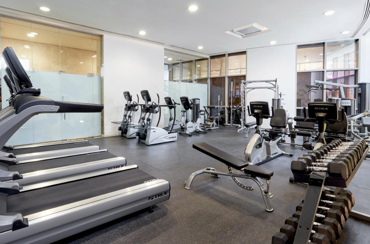 Best Plaza West Bay Hotel Doha Kültér fotó The gym at the 100 East 53rd Street building